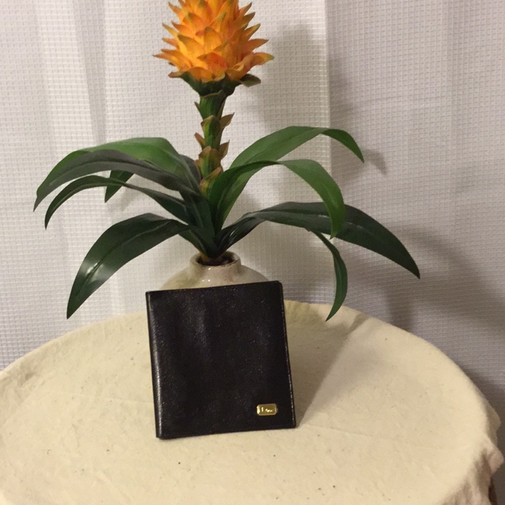 Dior men’s black leather wallet